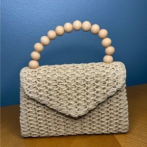 Elegant Cream Woven Handbag